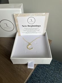 "Little Light". Gold crescent moon pendant.