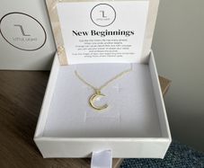 "Little Light". Gold crescent moon pendant.