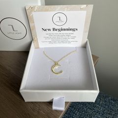 "Little Light". Gold crescent moon pendant.