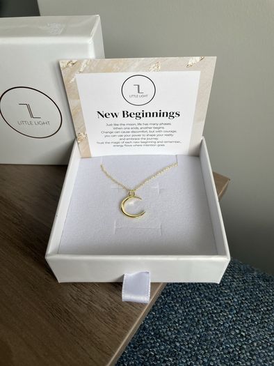 "Little Light". Gold crescent moon pendant.