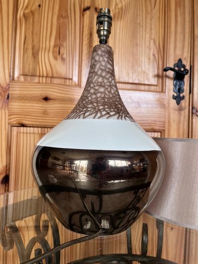 Ceramic lamp 65 euro. Brass with glass shade 95 euro . Chinese style 50 euro .