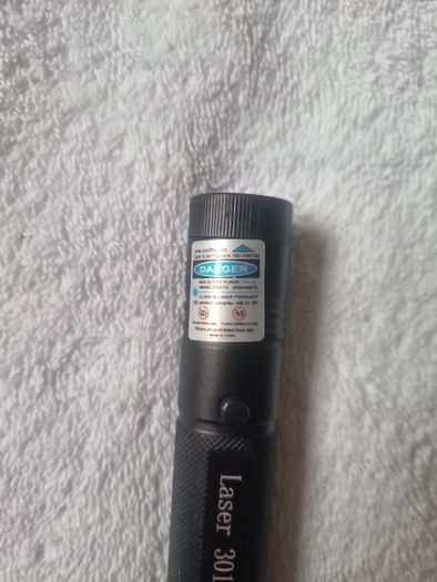 Strong (!!!) PURPLE laser pointer. 18+ (will need to check ID).