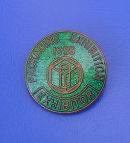 PACKAGING EXHIBITION 1959 EXHIBITOR (Olympia Hall, London) - a scarce exhibitor's enamel badge