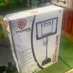 Portable basketball stand in box
