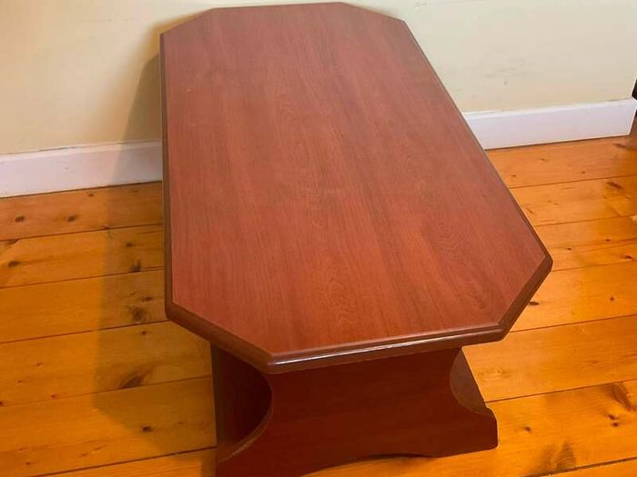 Elegant Dark Wood Coffee Table with Handy Storage Shelf