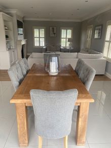Solid oak dining table and chairs