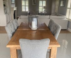 Solid oak dining table and chairs