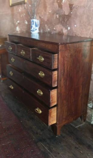 A George 111 inlaid mahogany Chest of Drawers
