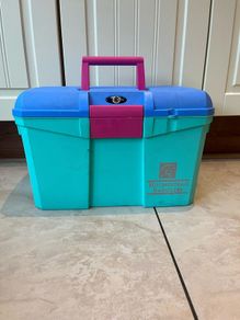 Equestrian tack box with 9 horse brushes