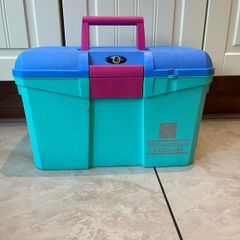 Equestrian tack box with 9 horse brushes