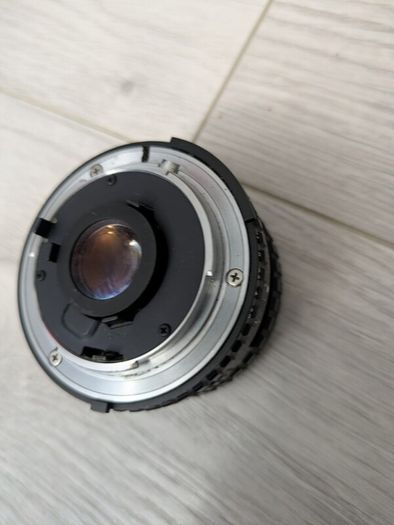 Nikon Series E 28mm f/2.8 manual focus wide-angle prime lenses.