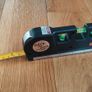 Brand new Cross Line Multipurpose Laser With  2.5M  Measure Tape Image 2