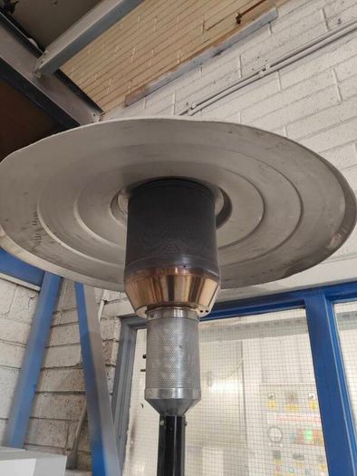 Commercial-grade patio heater suitable for outdoor commercial or residential use. Operates on propane or natural gas. Portable design with stable base. High heat output