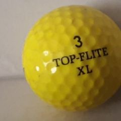 2 vintage golf balls