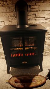 electric stove same as new looks like a real fire fab