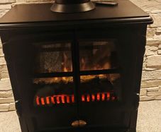 electric stove same as new looks like a real fire fab