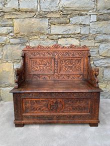 Late Victorian Gothic Revival Carved Oak Hall Settle.