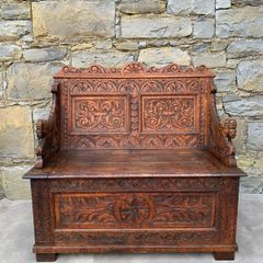 Late Victorian Gothic Revival Carved Oak Hall Settle.