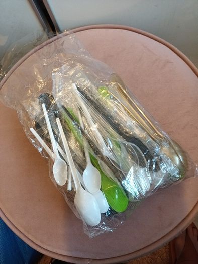 Bundle  of new disposable cutlery