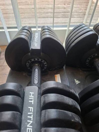 adjustable dumbells 5kg to 40kg and curling bar and plates