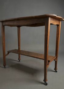 Early 20th Century Arts and Crafts Occasional Table on Castors