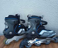 Grey and blue inline skates
