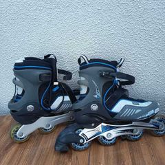 Grey and blue inline skates