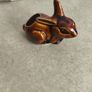 Brown rabbit majolica statue. Image 2