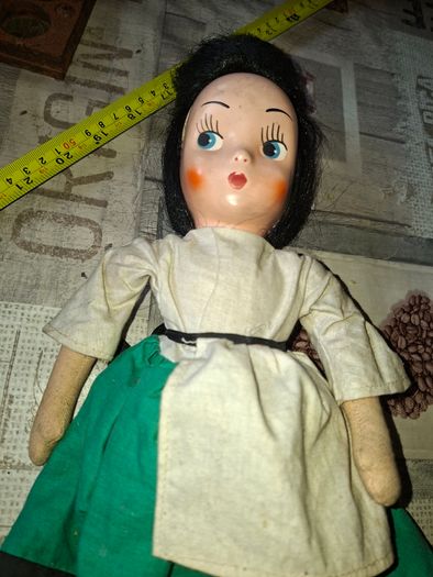 Vintage 1940s Papier Mache Doll, featuring a painted face on a soft fabric body,