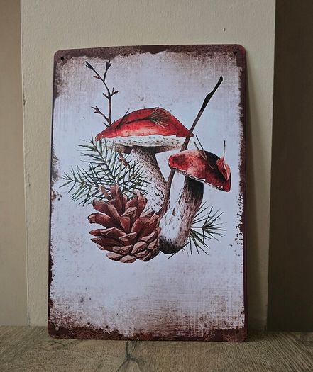 Tin sign with mushroom