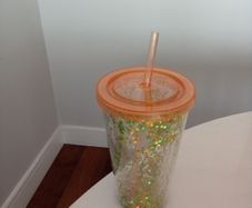 Reusable plastic cup with lid and straw