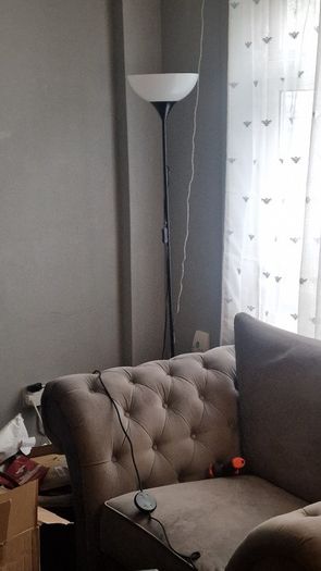 Black floor lamp with white uplighter shade