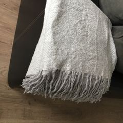 Grey throw for couch/armchair