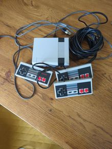 Retro NES loaded with games with 1 original controller and two super long cable controllers