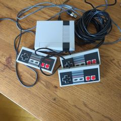 Retro NES loaded with games with 1 original controller and two super long cable controllers