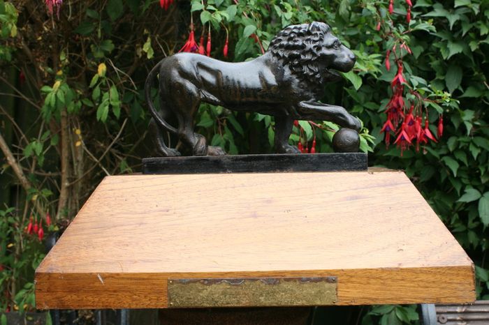 Antique Cast Iron Lion Figurine on Wooden Base
