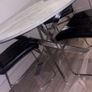 Round marble-effect dining table with 4 black chairs Image 6