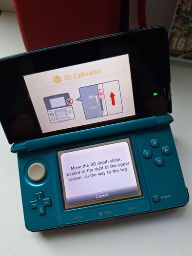 Aqua Blue Nintendo 3DS with games
