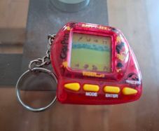 Jurassic Park The Lost World Tamagotchi Giga Pets Baby T-Rex 1997
