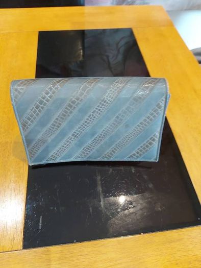 Grey Faux Leather  clutch bag .