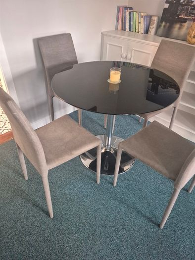 Smoked glass dining table & chairs + coffee table