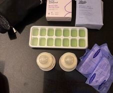 Baby weaning trays, 2 unused baby bottles and milk storage bags
