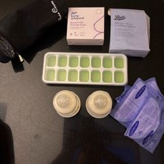 Baby weaning trays, 2 unused baby bottles and milk storage bags