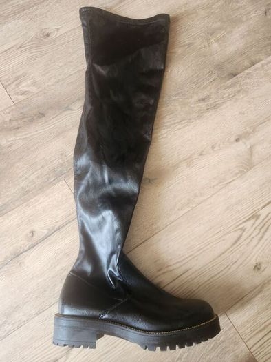 Over the knee black boots never used tried on in house.