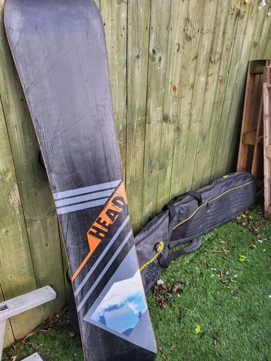 snowboard, bindings and bag