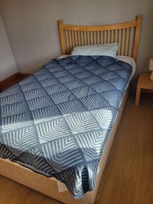 4 foot bed 6'6" long with mattress and slat headboard