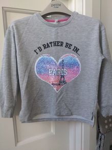 Flipping sequence sweat top