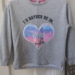 Flipping sequence sweat top