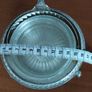 A vintage silver-plated butter dish or caviar bowl with a three-legged lid. Image 5