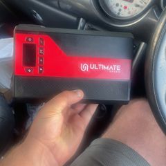 Portable battery booster pack